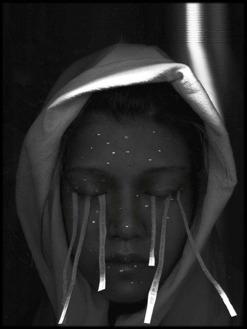 Blind Stars — a hooded self-portrait with silver threads falling from the eyes, small light points scattered across the face.