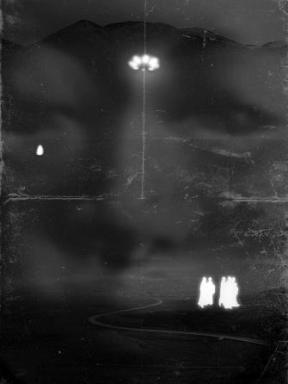 Instant.001 — a solitary figure on a hillside path.